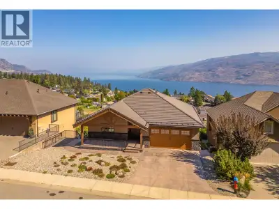 INCREDIBLE VIEWS FROM THIS QUALITY-BUILT CUSTOM HOME. Proudly presenting 6172 Seymoure Avenue with i...