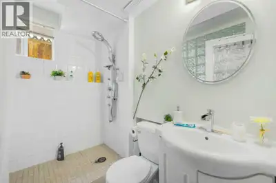 Basement unit with 1 bedroom and 1 bathroom, shared double garage attached and laundry, separate ent...