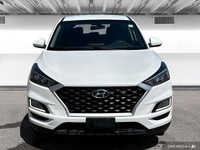 The 2020 Hyundai Tucson in Crystal White features all-wheel drive with advanced safety like lane dep... (image 8)