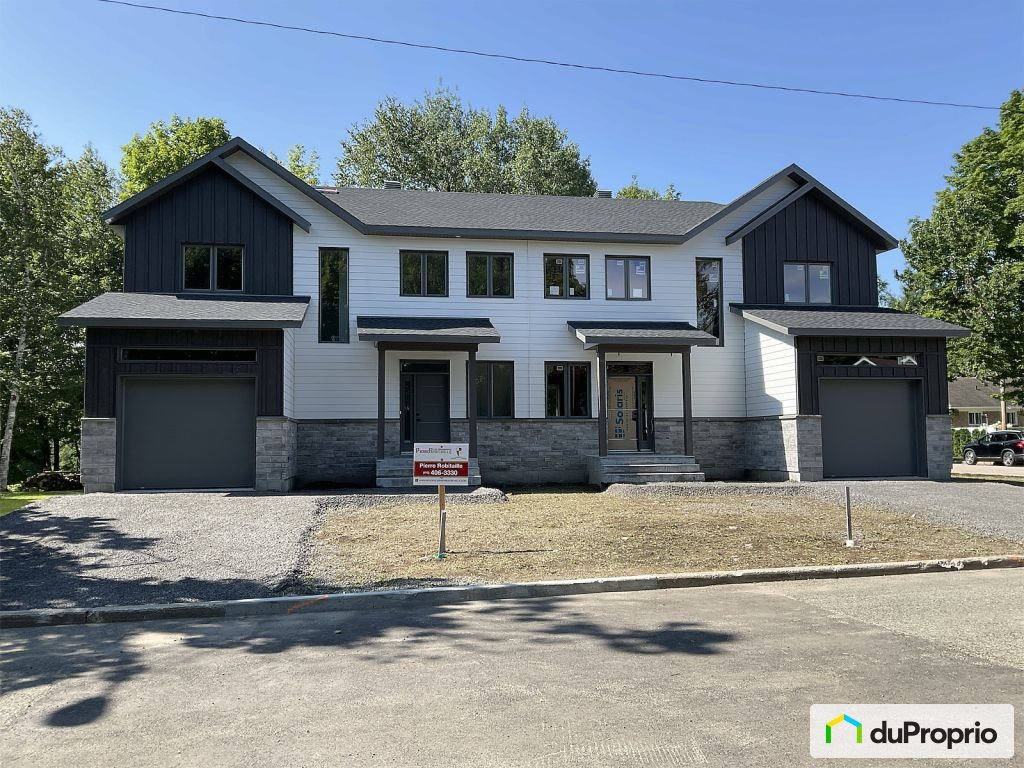 $676,000 - Semi-detached for sale in Boischatel — photo 1