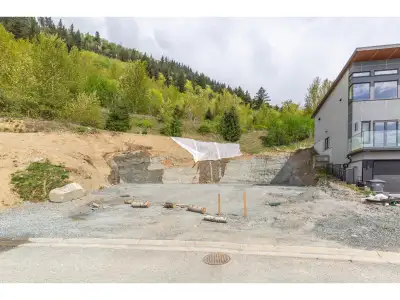 Perched high on a private laneway, this expansive 14,000+ sq.ft. lot offers unparalleled privacy and...