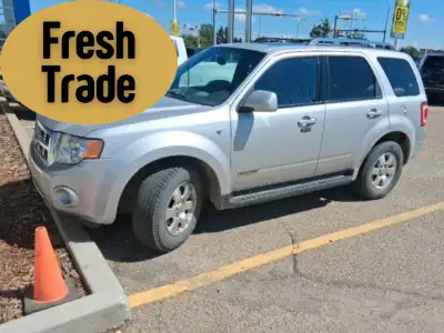 Experience confident all-season driving with the 2008 Ford Escape Limited, a versatile 4x4 SUV desig...