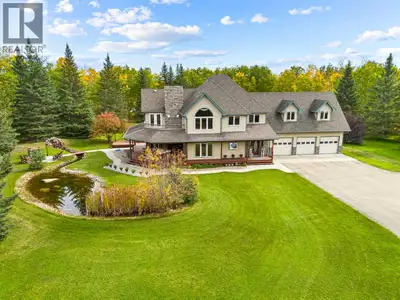 A truly exceptional acreage property offering the privacy and tranquility of country living with the...