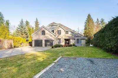 WELL BELOW BC ASSESSED VALUE. Executive 2 Story w/Basement Home On Almost An Acre In One Of The Most...