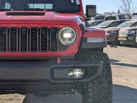 This Jeep Wrangler has a strong Intercooled Turbo Premium Unleaded I-4 2.0 L/122 engine powering thi... (image 9)
