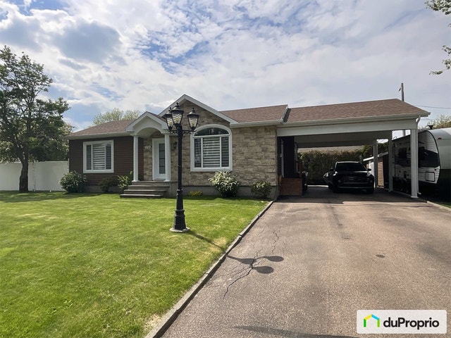 $435,000 - Bungalow for sale in Jonquière (Arvida) — photo 1