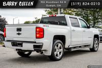 The 2018 Chevrolet Silverado 1500 LT in white offers the perfect balance of robust power and refined... (image 3)