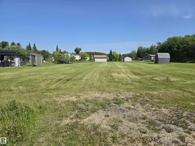 Escape to the peaceful shores of Lac La Nonne with this vacant lot situated just a short walk from t...