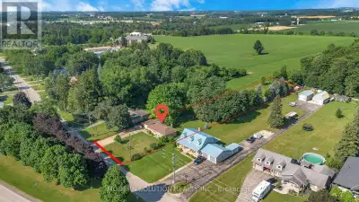 Rare opportunity to own this all-brick bungalow on over 1 acre in the highly sought-after Village of...