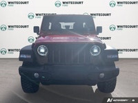 Introducing the vibrant 2022 Jeep Wrangler Unlimited Willys 4x4 in an eye-catching Firecracker Red,... (image 1)