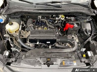 The 2024 Ford Escape ST-Line in sleek black boasts AWD capabilities, making it a versatile and relia... (image 9)