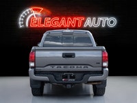2018 Toyota Tacoma TRD Off Road PKG 4WD Grey Exterior on Grey interior comes with Navigation and Bac... (image 4)