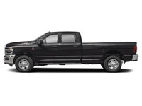 The 2026 Ram 3500 Tradesman 4x4 Crew Cab with an 8' Box in stunning black offers unmatched power and... (image 2)