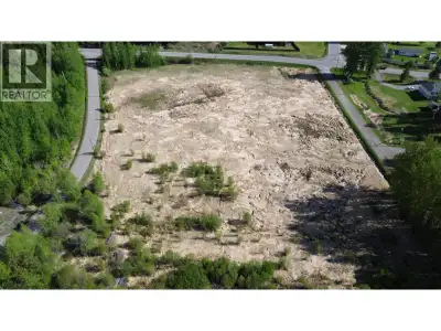 Investor opportunity on beautiful Dragon Lake! This rare 6.57-acre waterfront property offers except...