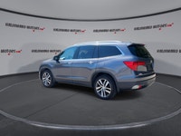 This used 2018 Honda Pilot Touring AWD is a roomy, family-ready SUV with smart features and proven V... (image 5)
