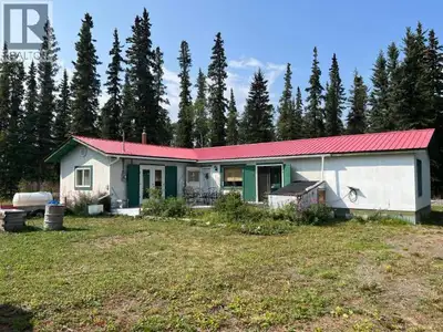 Your Yukon retreat in the heart of the Southern Lakes. This bungalow style residence has 4 bedrooms...
