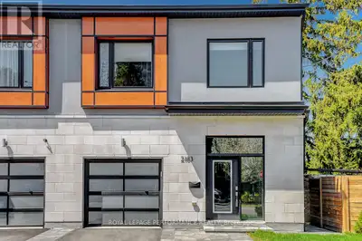 Stunning 3+1 bedroom, 3 1/2 bath semi on an oversized corner lot in fantastic location near Ottawa R...