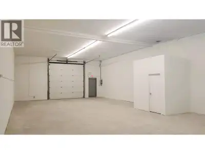 1,800 sf of industrial space featuring an open area warehouse with one 12' overhead door at grade le...