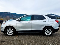 Presenting the 2019 Chevrolet Equinox LT, a sophisticated gray AWD SUV that promises excellent handl... (image 3)