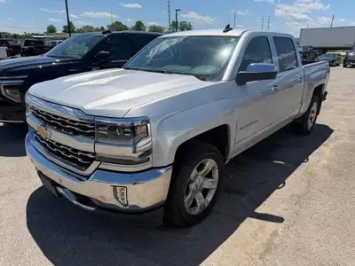 Presenting the 2018 Chevrolet Silverado 1500 LTZ in a bold color with 4x4 drivetrain. This truck is...