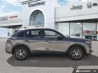 Engineered for the demands of the open road and city streets alike, this sleek gray 2025 Honda HR-V... (image 6)