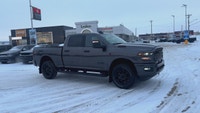 This 2025 RAM 3500 Big Horn Night Edition 4x4 Crew Cab 64 Box has the 6.7L Cummins I-6 Ho Turbo Dies... (image 1)