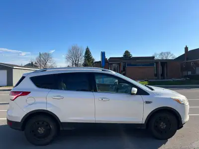 2015 Ford Escape SEL 4WD in excellent condition. Comes with Bluetooth, rear parking sensors, heated...