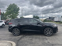 Immerse yourself in elevated sophistication with the 2025 Acura RDX Platinum Elite A-Spec, a stunnin... (image 3)