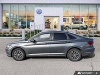 Effortless elegance meets modern functionality in this 2019 Volkswagen Jetta Highline, showcasing ju... (image 1)