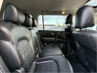 The 2023 Nissan Armada 4x4 Platinum in a striking black finish is a powerhouse SUV designed for both... (image 7)