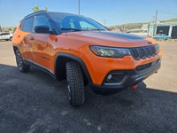 For a quick response please text 403-820-9940. AMVIC licensed business The 2026 Jeep Compass Trailha... (image 6)