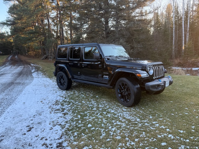 Sahara Plug-in hybrid, good condition, newer tires, leather, will safety. Low ball "cash" offers wil...