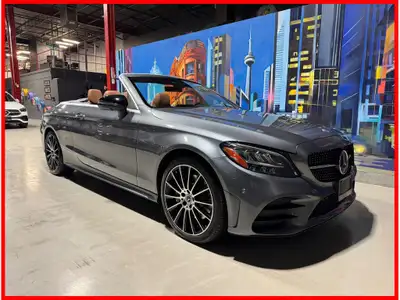 Selenite Grey Metallic Exterior On Saddle Brown Leather Interior, An Aluminum Trim, Black Soft Top,...