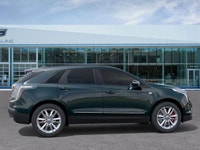 Stock #YK104659 AMVIC LICENSED DEALER The 2026 Cadillac XT5 Sport AWD, finished in Emerald Lake Meta... (image 9)