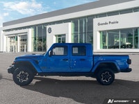 Unleash true adventure with this formidable 2021 Jeep Gladiator Rubicon. Powering this Hydro Blue Pe... (image 1)