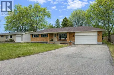STUNNING, MOVE-IN READY BRICK RANCH IN THE HIGHLY SOUGHT-AFTER TECUMSEH AREA, SITUATED ON AN IMPRESS...