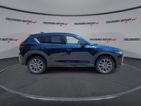 Finished in blue with a black interior, this used 2021 Mazda CX-5 GT AWD brings together upscale com... (image 8)