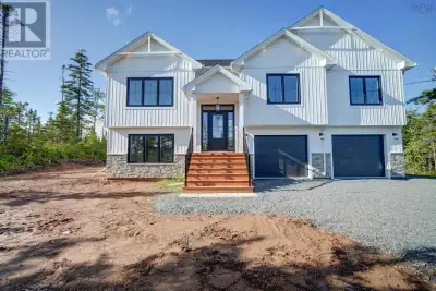 Welcome to The Cabot by Marchand Homes, a fully completed, move-in ready, well-designed split-entry...