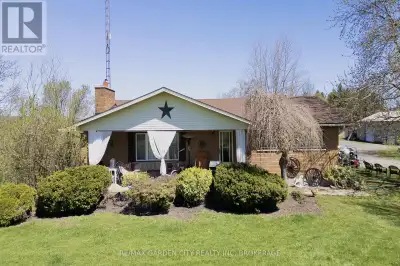 Peaceful country lifestyle minutes from the city!! This 4 bedroom, 2 bathroom bungalow has over 14 a...
