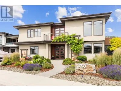 Exceptional 5-bedroom Lakeview Heights home with a legal suite, pool, and custom finishes throughout...