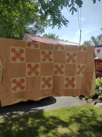 Peach colored quilt with flowers 75 x 78, View more