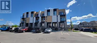 Welcome to this meticulously maintained, turn-key stacked townhouse in Waterloo's highly sought-afte...