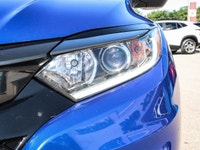 Experience the excitement of driving the **2019 Honda HR-V Sport** in stunning blue, equipped with a... (image 6)