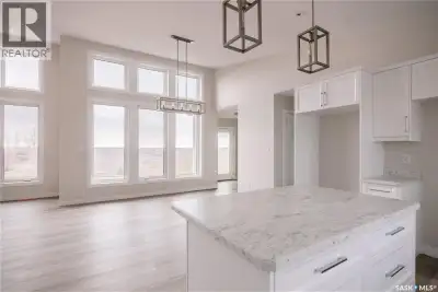 Wake up each morning to the beauty of the valley and wide-open prairie skies from this stunning newl...