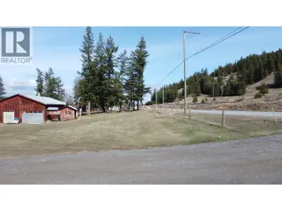 Highway frontage with character and opportunity! This 2.48-acre property is conveniently located app...