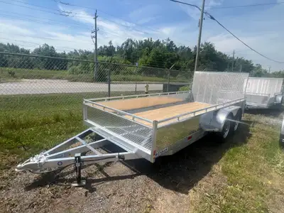 Standard Features: Rear Meshed Reinforced Straight Gate Upgrade (2) 3500 lb Axle with electric brake...