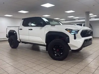 The latest 2025 Toyota Tacoma Hybrid brings meaningful refinement to Toyotas midsize pickup formula,...