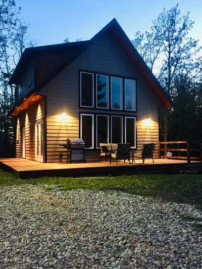 2 year old home with a 2400 sq ft insulated and heated shop on 2.5 beautiful acres just west of Calg...