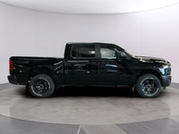 Experience the power and versatility of the new 2026 Ram 1500 Warlock in a striking black finish. Th... (image 5)