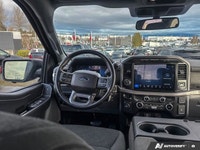 Beneath the rugged exterior of this 2024 Ford F-150 XLT Crew Cab Pickup lies the robust 3.5L V6 EcoB... (image 8)